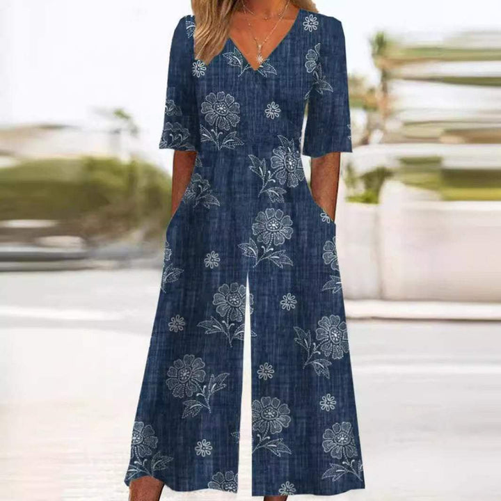 Emma | Dame Boho Blomsterprint Jumpsuit V-hals Halværmer Lommer